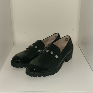 Black loafers with silver studds